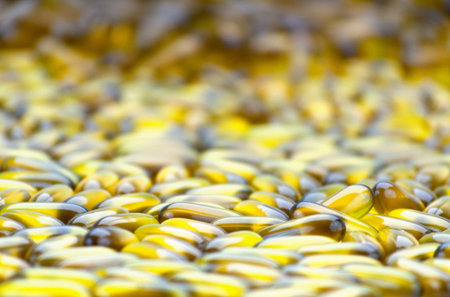Closeup of group of coconut oil capsules  Selective Focus