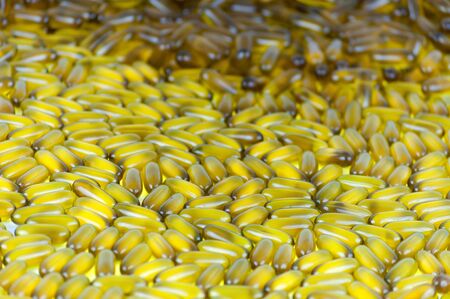 Closeup of group of coconut oil capsules  Selective Focusの写真素材