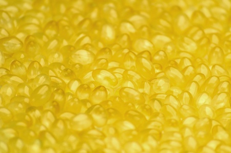 Closeup of group of coconut oil capsules  Selective Focusの写真素材