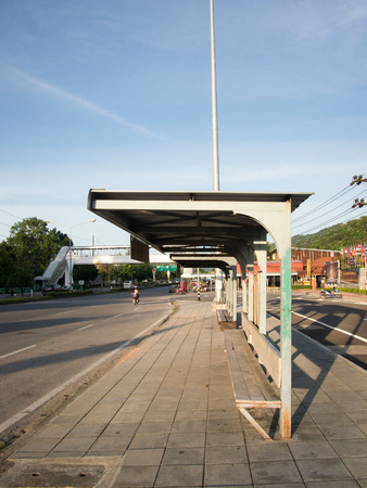 lonely bus stop with sky backgroundの写真素材