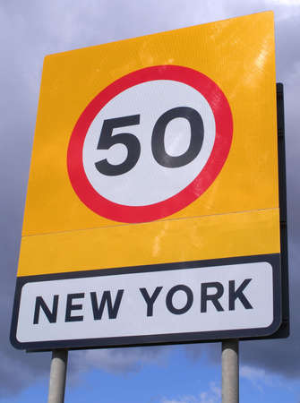Speed restriction and village boundary sign for New York (near Boston, Lincolnshire, England)の写真素材