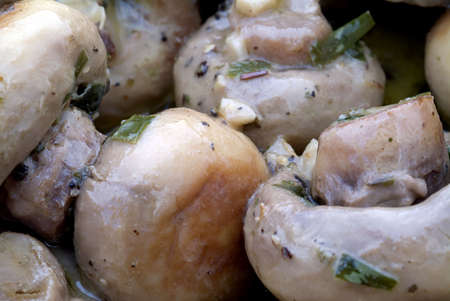 Macro close-up of a traditional tapas of mushrooms marinaded vinaigrette.の写真素材
