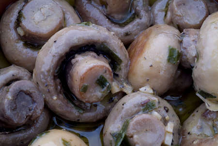 Macro close-up of a traditional tapas of mushrooms marinaded vinaigrette.の写真素材
