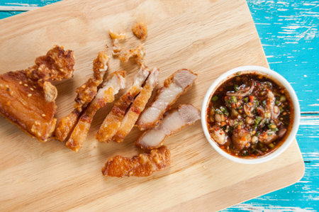 Deep fried pork belly  with spicy sauceの写真素材