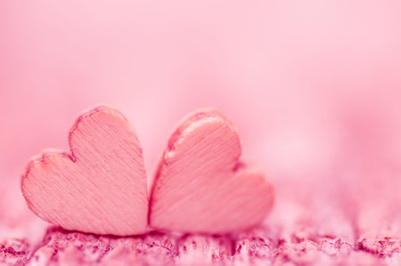 Two wooden hearts , Valentine ' s day concept