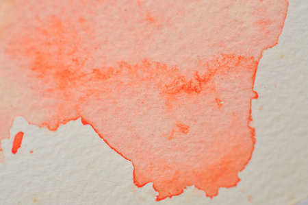 Abstract orange watercolor background texture on white,hand painted on paperの写真素材