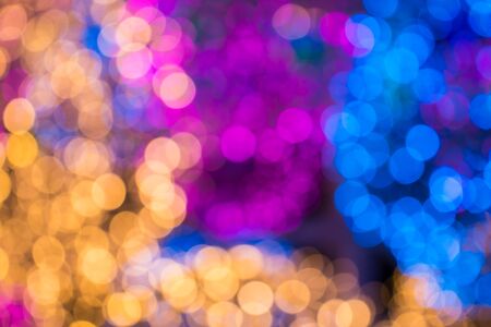 Light bulbs a lot of color in blur backgroundの写真素材