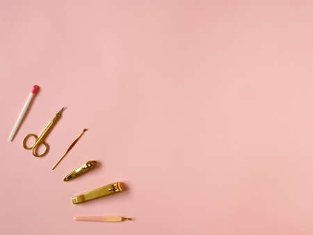 Manicure set for nail care on pink background.の写真素材