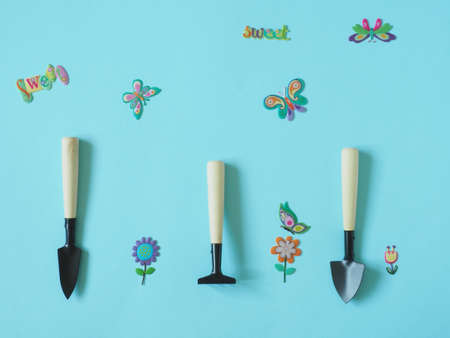 Set of different garden tools on blue background.の写真素材