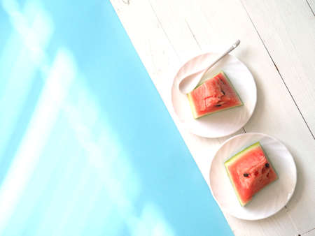 Concept of summer holidays with beach items on a blue background. The view from the top.の写真素材