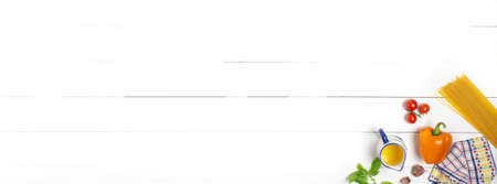 Spaghetti with tomatoes and Basil on a white wooden background. Ingredients. Banner.の写真素材