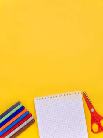 School supplies on an orange background. School concept, office supplies. A copy of this place.の写真素材