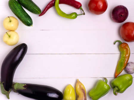 Organic food background. Photo of various fruits and vegetables on a white wooden table.の写真素材