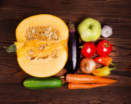 Fruits and vegetables on a wooden background. Concept of healthy food , farm products, natural food,...