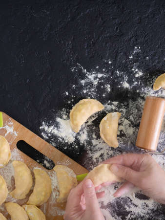 A woman makes ravioli, dumplingsの写真素材