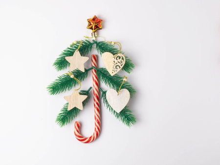 Christmas holiday background with board and decorations, gift boxes on the gray textured board View from aboveの写真素材