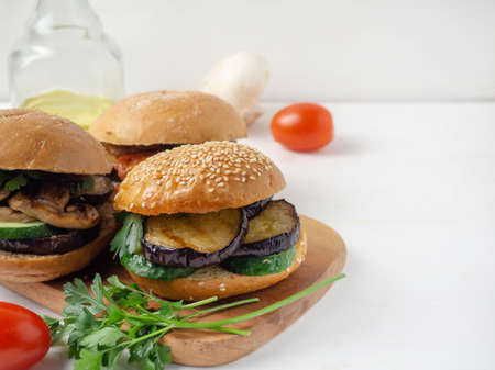 Vegetarian burgers made of eggplant, mushrooms, cucumbers, tomatoes and herbs.の写真素材