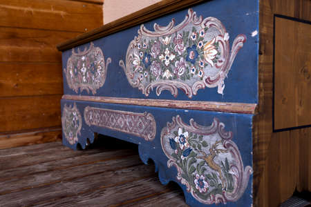 Antique painted wardrobe stands against the wallの写真素材
