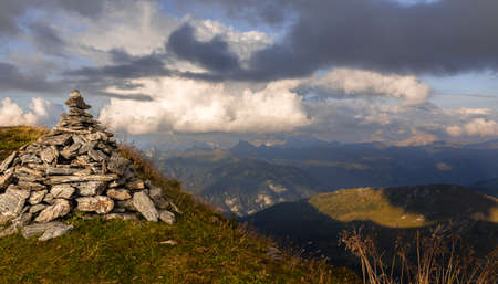 Cloudy sky over a range of Alpine mountains in western Austriaの写真素材