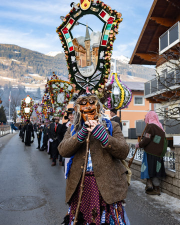 AUSTRIA, GASTEIN - January 1, 2023: Witch and participants in the Perchtenlauf procession in the Austrian Gastein Valleyのeditorial素材