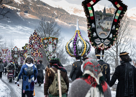 AUSTRIA, GASTEIN - January 1, 2023: movement of participants in the procession of perchts in the Austrian Gastein Valleyのeditorial素材