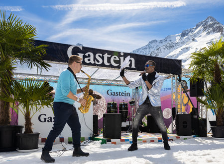 AUSTRIA, SPORTGASTEIN - March 18, 2023: Event Palmen auf den Almen, performers perform in an open areaのeditorial素材