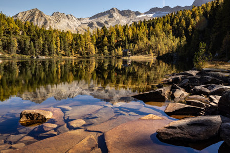Wonderful view of the mountain alpine lake Reed See in late autumn, bright colors make this view unforgettable, Austriaの写真素材