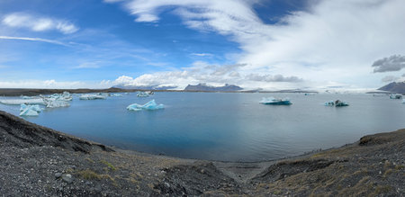 Icebergs Floating in Jokulsarlon Glacial Lagoon on a Sunny Day