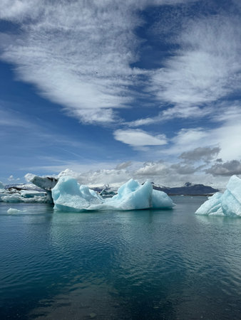 Blue Icebergs Floating in the Jokulsarlon Glacial Lagoon on a Sunny Day