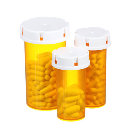 Pill bottles isolated on white background  American three medical containersの写真素材
