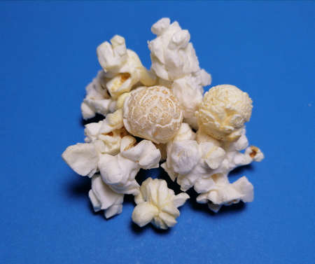 Popcorn on blue backgroundの写真素材