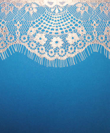 Lace on blue backgroundの写真素材