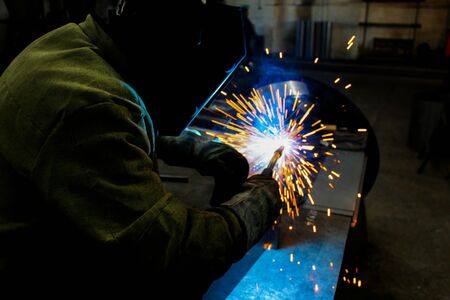 welder work, welding sparks, workshop productionの写真素材