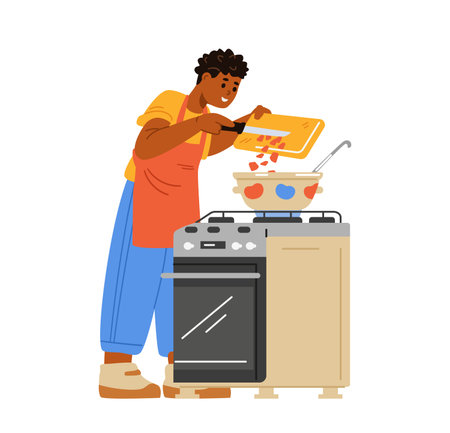 African American teenage boy making soup on a gas stove flat vector illustration isolated on white. Kid in apron putting vegetables in a pan.のイラスト素材