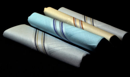 Handkerchiefs on a black background, close-up of photoの写真素材