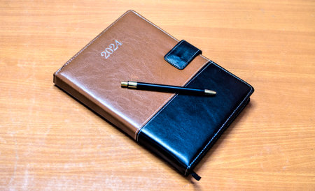 Photo of a 2024 diary with a ball penの写真素材