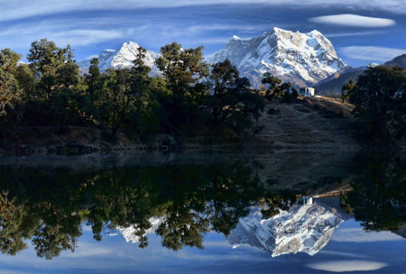 Photo of Deoratal with the reflection of Mount Chaukhambaの写真素材