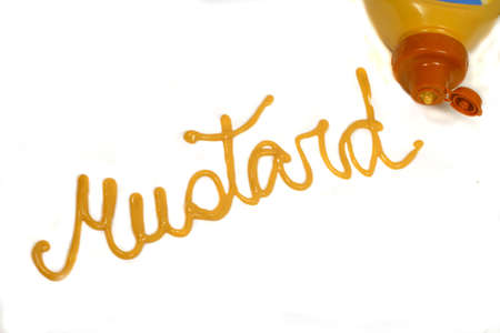 mustard written with mustardの写真素材