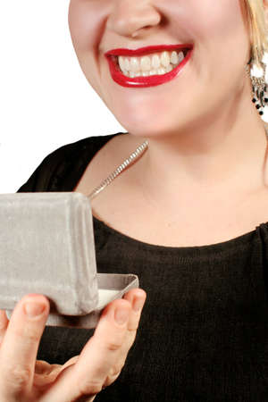 woman receives jewelryの写真素材