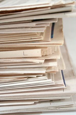 stacked newspapers