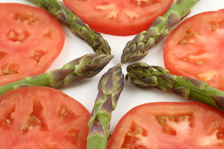 asparagus and sliced tomatoの写真素材