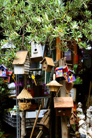 birdhouses and other crafts at a Paris marketの写真素材