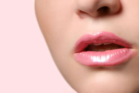 pink glossy lips (with copyspace)の写真素材