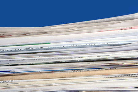 a stack of due  monthly bill payments