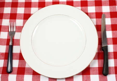 waiting for meal with empty plate at restaurantの写真素材