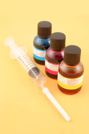 cyan, magenta, and yellow injet refill inks and needleの写真素材
