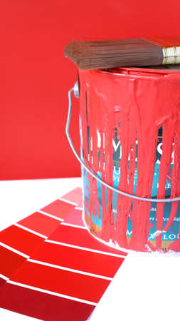  paint swatches, and  paintbrush and red paint can for home decoratingの写真素材