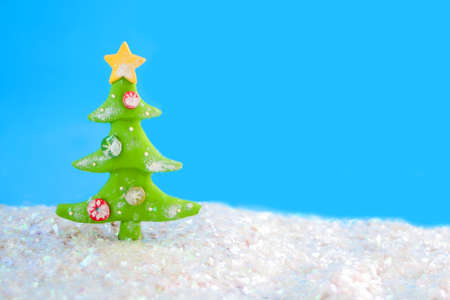 christmas tree ornaments scene with sparkling fake snow の写真素材