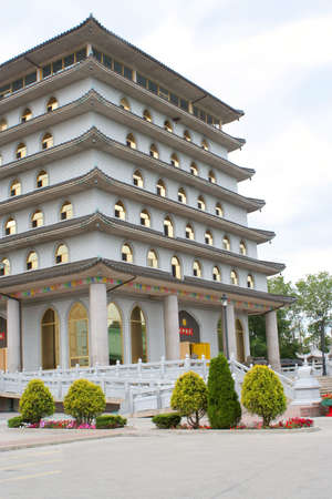 a buddhist temple architecture with gold windowsの写真素材