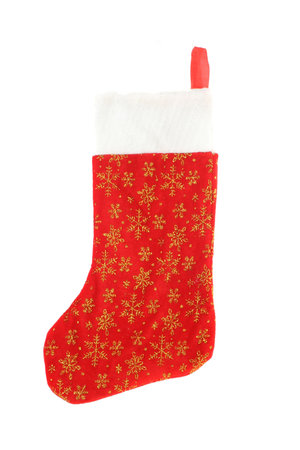 festive christmas stocking with gold stars hanging isolated on a white background